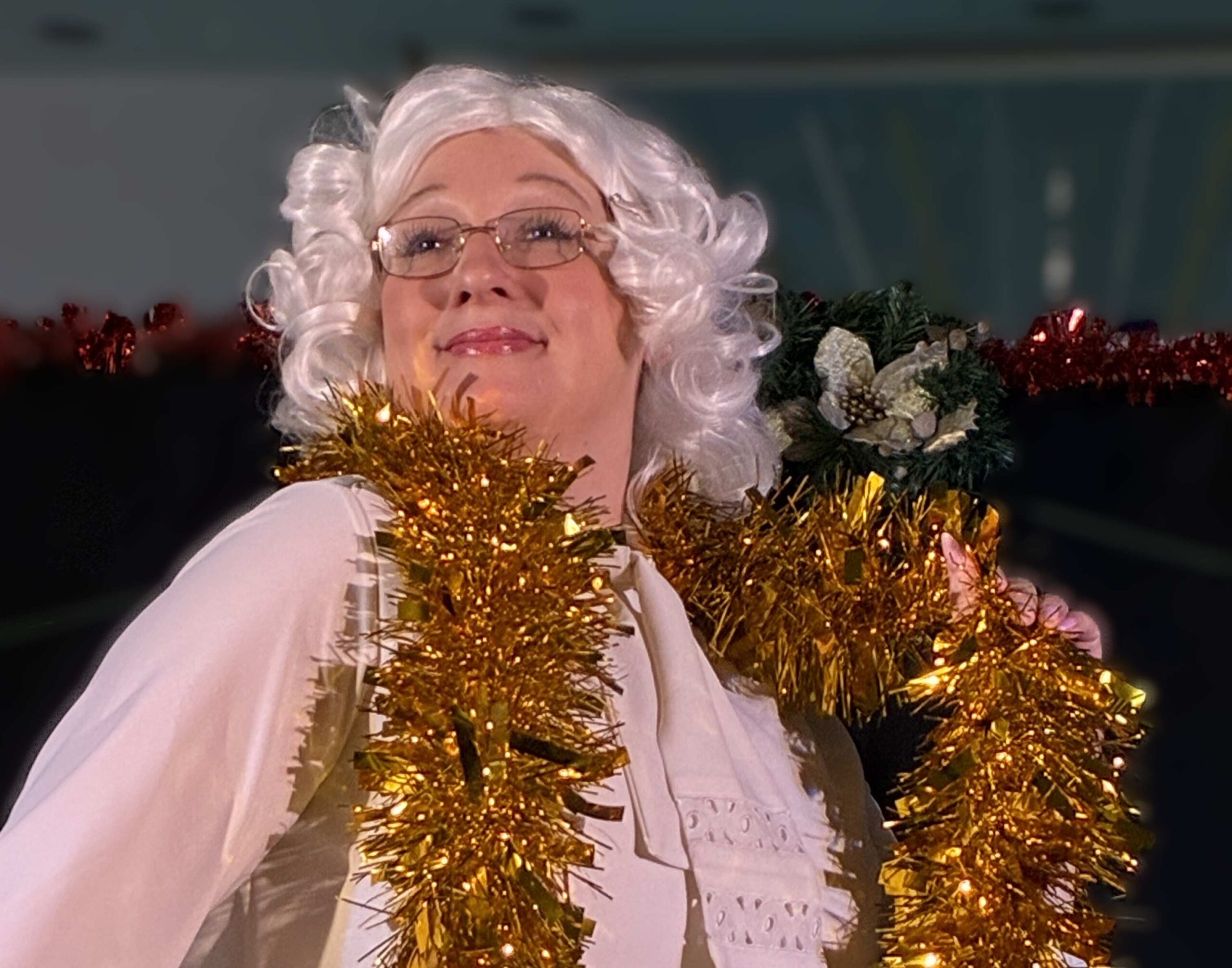 Scene from Heavenly Realms actor with tinsel and white hair